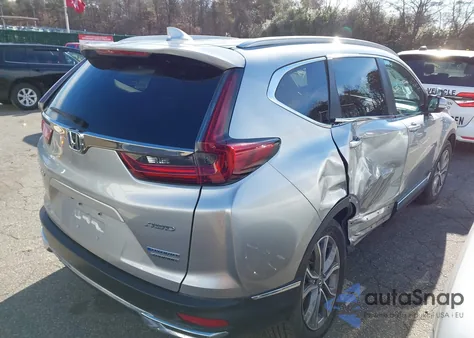 2021 Honda Cr-V Hybrid Touring z USA, uszkodzony, nr VIN 7FART6H93ME038094